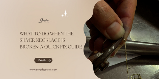 the silver necklace is broken