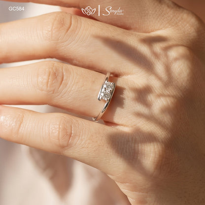 Dainty 925 sterling silver two-stone bypass ring featuring twin brilliant round cubic zirconia gems in a modern Toi et Moi setting.