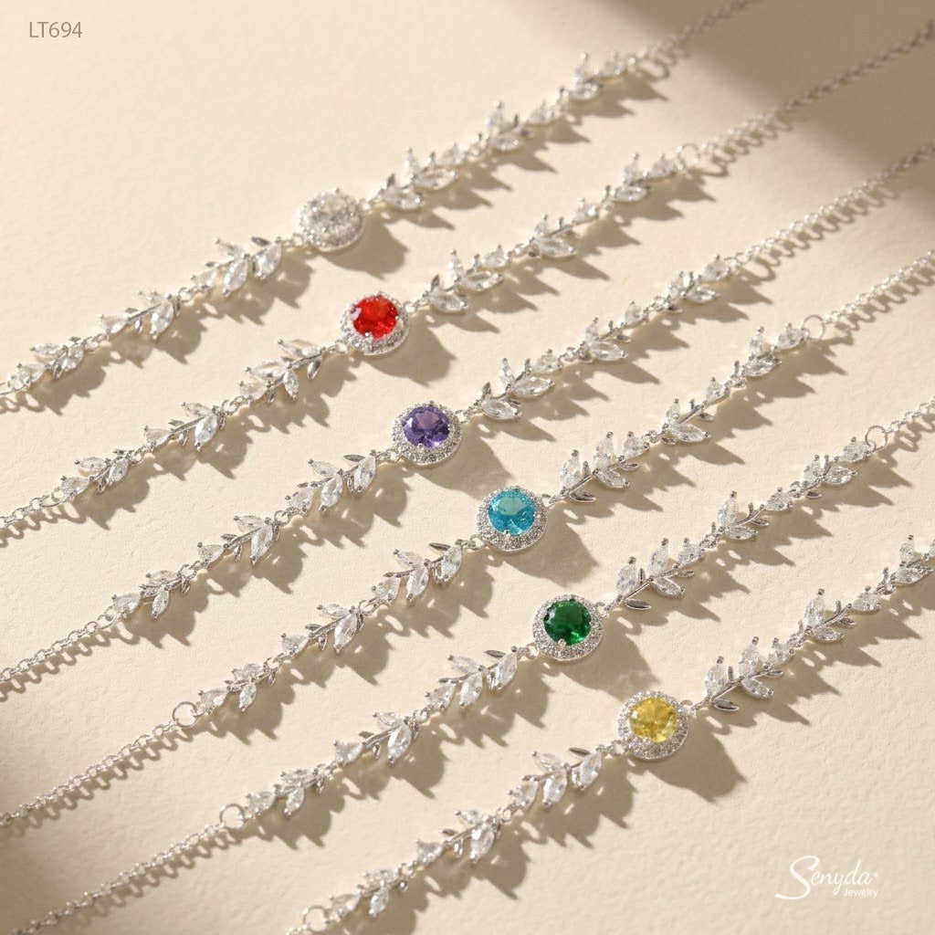 Six halo leaf vine bracelets in clear, red, purple, aqua, green and yellow birthstone colors, sterling silver and CZ