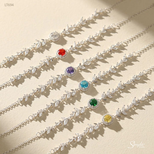 Six halo leaf vine bracelets in clear, red, purple, aqua, green and yellow birthstone colors, sterling silver and CZ