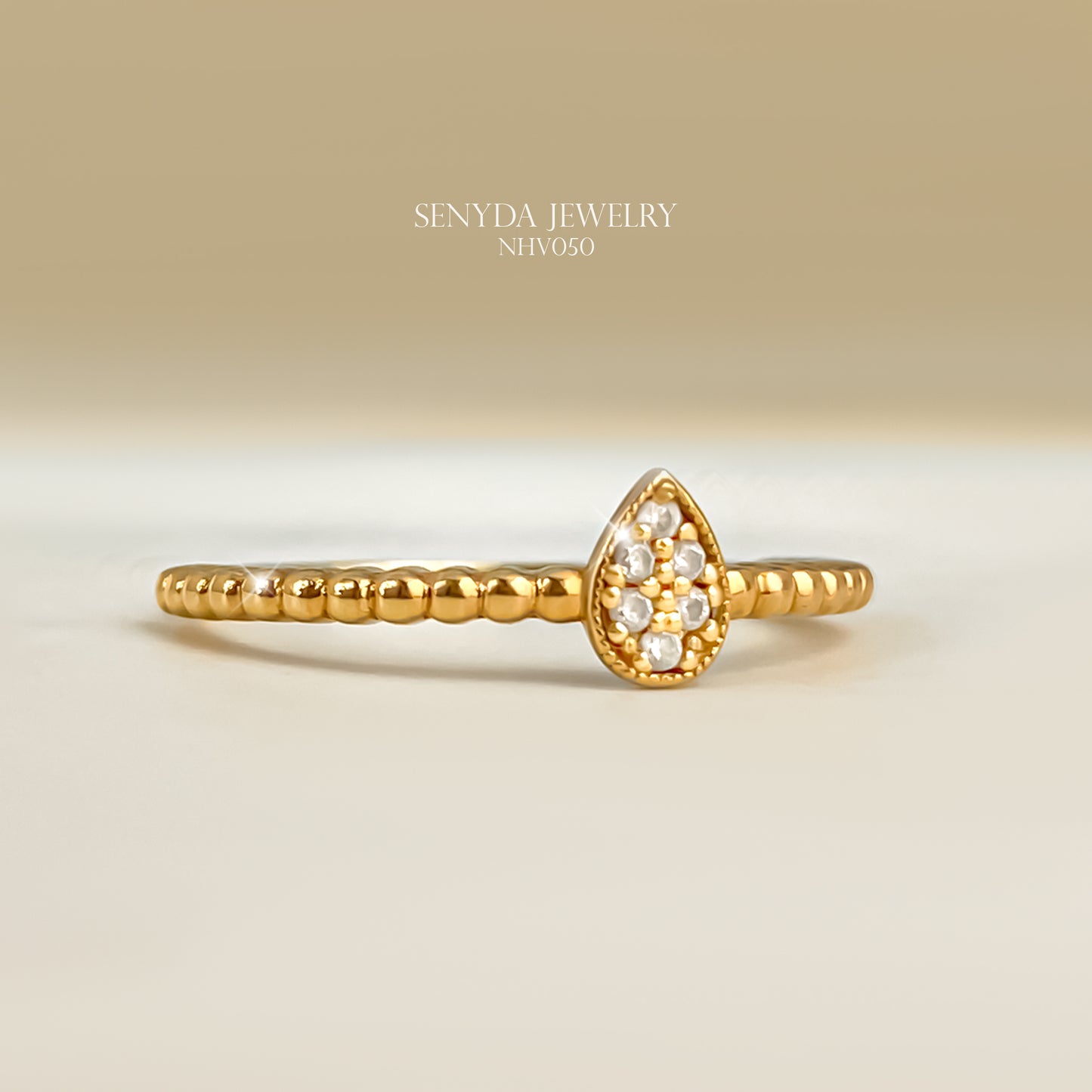 10K Solid Gold Pear-Shaped Micro Cluster CZ Ring