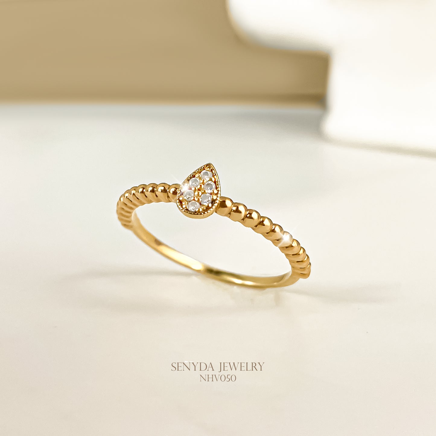 10K Solid Gold Pear-Shaped Micro Cluster CZ Ring