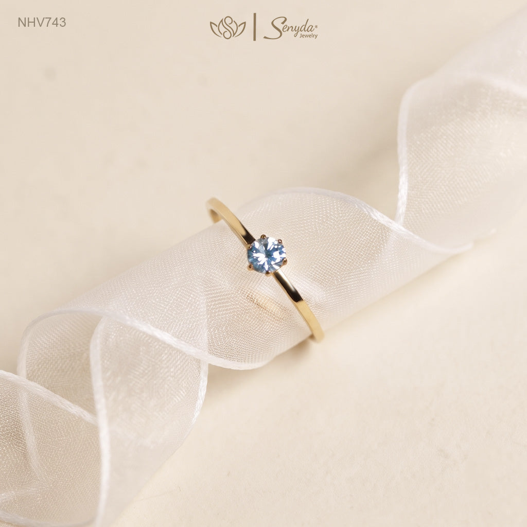 Dainty solid gold solitaire ring with a 3.5mm round stone in a six-prong setting on a thin 1mm band