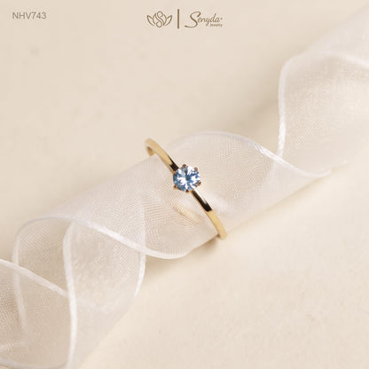 Dainty solid gold solitaire ring with a 3.5mm round stone in a six-prong setting on a thin 1mm band