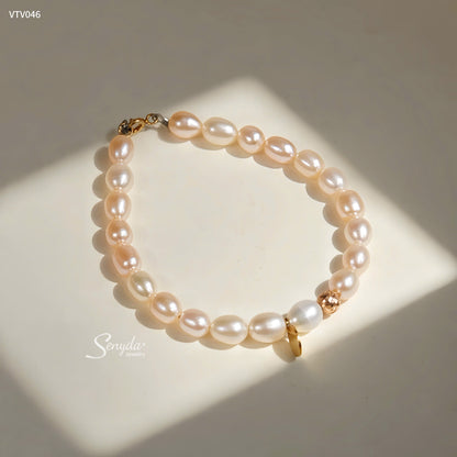 Senyda 10K Solid Gold Freshwater Pearls 8x6,5mm Bracelet With Roundtag And Beads